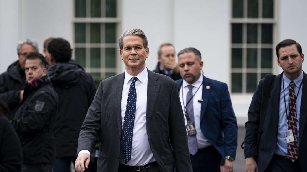 epa11964021 US Treasury Secretary Scott Bessent (C) walks to a television interview outside the White House in Washington, DC, USA, 14 March 2025.  EPA/AL DRAGO / POOL