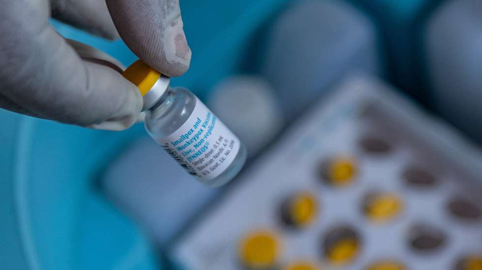 epa11644020 A medical staff displays a vial containing a vaccine for smallpox and mpox made by Danish drugmaker Bavarian Nordic in a symbolic start of the mpox vaccination campaign at Goma General Hospital, in Goma, Democratic Republic of Congo, 05 October 2024. The Democratic Republic of Congo received 265,000 doses of the MVA-BN vaccine donated by the European Commission's Health Emergency Preparedness and Response Authority, Gavi, the Vaccine Alliance, and the US government. According to the RDC Health Minister Samuel-Roger Kamba, the country has recorded more than 30,000 mpox cases, with 988 deaths.  EPA/MOISE KASEREKA