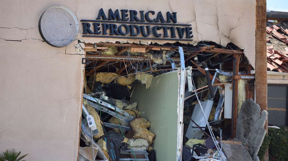 epa12111428 The American Reproductive Centers office is damaged after an explosion, in Palm Springs, California, USA, 17 May 2025. At least one person is dead and multiple were injured in an explosion outside a Palm Springs, CA fertility clinic, which Palm Springs Police called an 'intentional act of violence'.  EPA/ALLISON DINNER