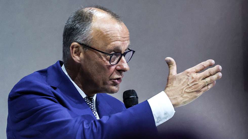 epa12212082 German Chancellor Friedrich Merz speaks as he attends the Volksbanken and Raiffeisenbanken annual banking conference in Berlin, Germany, 03 July 2025. The 80th Banking Conference of the Volksbanken and Raiffeisenbanken is held under the motto ‘GenoNextLevel’.  EPA/FILIP SINGER