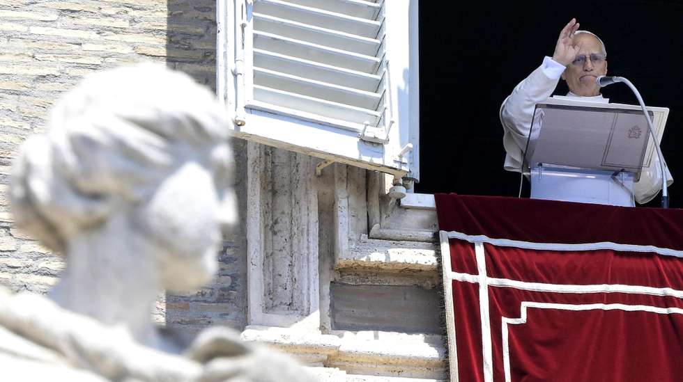 epa12219823 Pope Leo XIV delivers the Angelus prayer from the window of his office overlooking Saint Peter's Square in the Vatican City, 06 July 2025.  EPA/RICCARDO ANTIMIANI