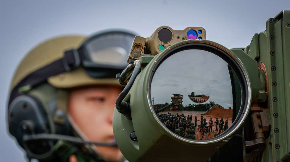 epaselect epa12228270 Taiwanese military personnel participate during the US Made M1A2T tanks live fire drill that coincides with the annual Han Kuang military exercises, in Hsinchu county, Taiwan, 10 July 2025. Taiwanese Armed Forces began the annual Han Kuang exercises, large-scale military drills aimed at testing the troops' defensive capabilities in the event of a potential invasion by China, and are scheduled between 09-18 July.  EPA/RITCHIE B. TONGO