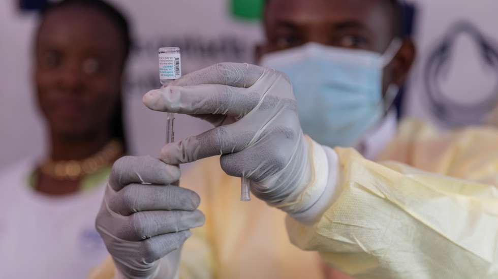 epa11644021 A medical staff displays a vial containing a vaccine for smallpox and mpox made by Danish drugmaker Bavarian Nordic in a symbolic start of the mpox vaccination campaign at Goma General Hospital, in Goma, Democratic Republic of Congo, 05 October 2024. The Democratic Republic of Congo received 265,000 doses of the MVA-BN vaccine donated by the European Commission's Health Emergency Preparedness and Response Authority, Gavi, the Vaccine Alliance, and the US government. According to the RDC Health Minister Samuel-Roger Kamba, the country has recorded more than 30,000 mpox cases, with 988 deaths.  EPA/MOISE KASEREKA