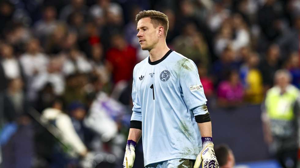 epa12156162 Goalkeeper Marc-Andre ter Stegen of Germany looks disappointed after losing the UEFA Nations League semi-final soccer match between Germany and Portugal, in Munich, Germany, 04 June 2025.  EPA/ANNA SZILAGYI