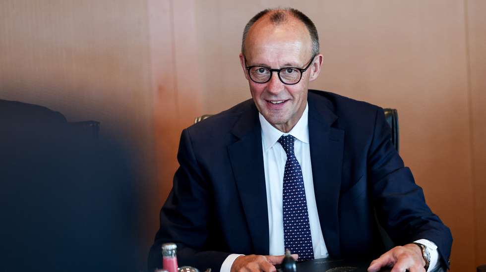 epa12285742 German Chancellor Friedrich Merz attends the federal cabinet meeting at the Chancellery in Berlin, Germany, 06 August 2025.  EPA/Filip Singer