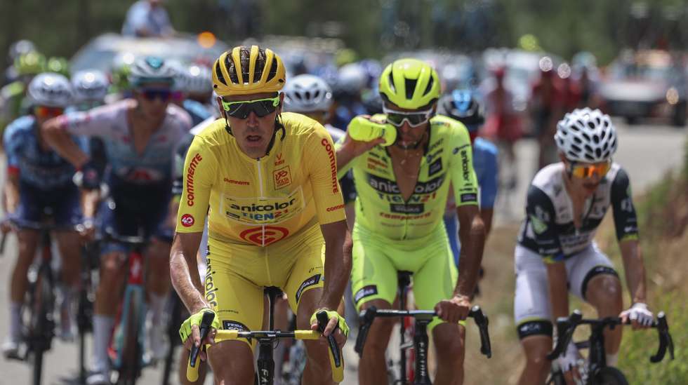Russian cyclist Artem Nych (L) (Anicolor-Tien21) keeps the yellow jersey during the sixth stage of the 86th Volta a Portugal over 175,2 km between Águeda and Guarda, Portugal, 12th August 2025. TIAGO PETINGA/LUSA