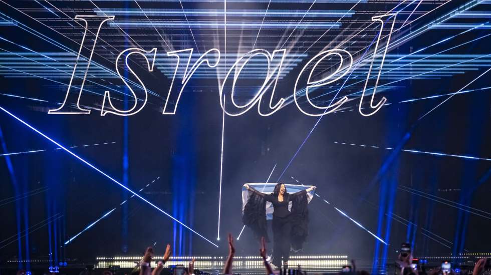 epa12111126 Israel's Yuval Raphael takes part in the flag parade during the final at the 69th Eurovision Song Contest in Basel, Switzerland, 17 May 2025.  EPA/GEORGIOS KEFALAS