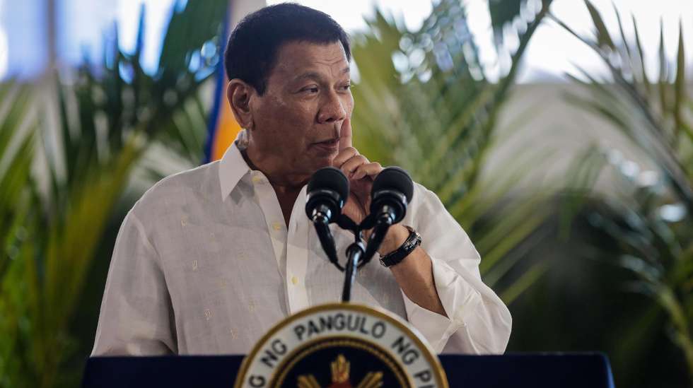 epa12399020 (FILE) - Philippine President Rodrigo Duterte gestures during a press conference prior to his departure for Vietnam, at Manila International Airport in Pasay City, south of Manila, Philippines, 28 September 2016 (reissued 23 September 2025). International Criminal Court (ICC) prosecutors have charged former Philippine president Rodrigo Duterte with three counts of crimes against humanity, alleging his role in at least 76 murders tied to the country’s anti-drug campaign. A redacted charge sheet dated 04 July but released on 22 September details the counts, including 19 killings in Davao City between 2013 and 2016, 14 murders of “high value targets” in 2016–2017, and 43 killings during clearance operations against alleged drug users and pushers between 2016 and 2018. Duterte is being held at the ICC’s detention unit in Scheveningen, The Hague, after his arrest in Manila on 11 March.  EPA/MARK R. CRISTINO *** Local Caption *** 53039524