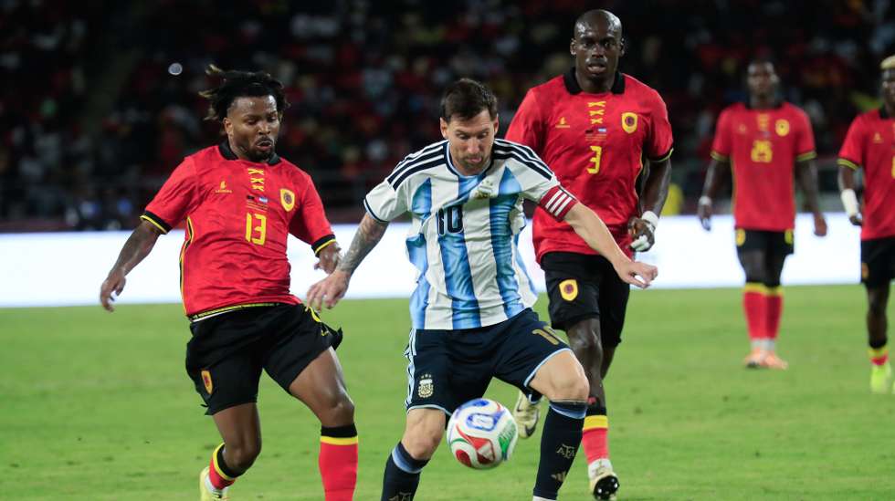 Argentina`s Lionel Messi (R) in action against Angola`s To Carneiro (L) during the friendly soccer match with Angola held at National Stadium, Luanda, Angola, 14th November 2025. This soccer match is part of the celebrations of the 50th anniversary of Angola independence. AMPE ROGERIO/LUSA