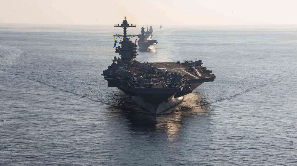 epa10908678 (FILE) - A handout file photo made available by the US Navy shows the aircraft carrier USS Gerald R. Ford (CVN 78) in the Ionian Sea, part of the Mediterranean Sea, 04 October 2023 (issued 09 October 2023). In response to the Hamas attack on Israel, the United States has begun moving the USS Gerald R. Ford Carrier Strike Group to the eastern Mediterranean, US Defense Secretary Austin announced on 08 October 2023, adding that the US will provide Israel with additional equipment and ammunition. The US naval force includes aircraft carrier USS Gerald R. Ford (CVN-78), cruiser USS Normandy (CG 60) as well as the destroyers USS Thomas Hudner (DDG 116), USS Ramage (DDG 61), USS Carney (DDG 64) and USS Roosevelt (DDG 80). Hundreds of Israelis and Palestinians have died after the militant group Hamas launched an unprecedented attack on Israel from the Gaza Strip on 07 October 2023.  EPA/US NAVY/MC2 JACOB MATTINGLY HANDOUT  HANDOUT EDITORIAL USE ONLY/NO SALES