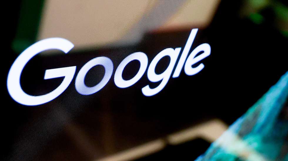 epa12518669 Google logo is seen during a press conference held by Google on the investment plan for Germany, in Berlin, Germany 11 November 2025.  EPA/Filip Singer