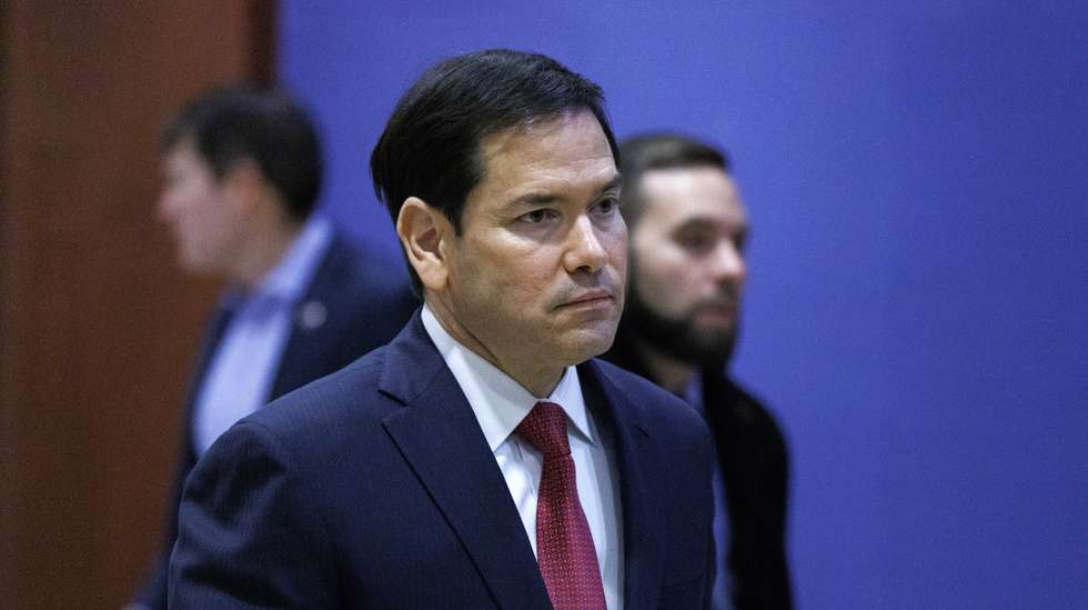 epa12596589 US Secretary of State Marco Rubio (C) arrives to brief lawmakers on national security issues including US military action taken against Venezuela, at the US Capitol in Washington DC, USA, 16 December 2025.  EPA/WILL OLIVER