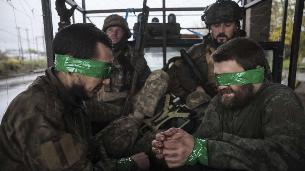 epa12502170 A handout photo made available by the press service of the 24th Mechanized Brigade of Ukrainian Armed Forces 04 November 2025 shows Russian prisoners of war captured by the servicemen of the 24th Mechanized Brigade named after King Danylo, not far from the frontline positions near Chasiv Yar, Ukraine, 28 October 2025, amid the ongoing Russian invasion. Russian troops entered Ukrainian territory on 24 February 2022, starting a conflict that has provoked destruction and a humanitarian crisis.  EPA/Press service of the 24 Mechanized brigade HANDOUT HANDOUT  HANDOUT EDITORIAL USE ONLY/NO SALES
