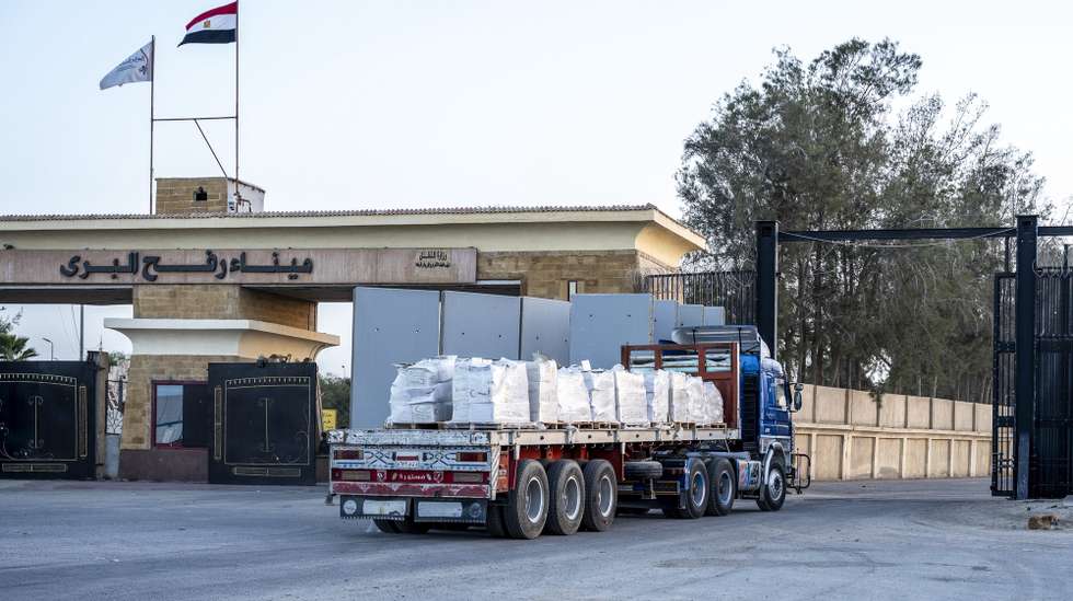 epa12696707 A humanitarian aid truck moves through the Rafah border crossing, between Egypt and the Gaza Strip, in Rafah, North Sinai Governorate, Egypt, 01 February 2026. The crossing was opened on a trial basis on 01 February morning to facilitate the entry of essential supplies and ambulances. An official reopening is scheduled for 02 February, marking a critical step in the delivery of international relief following the cessation of major hostilities.  EPA/STRINGER