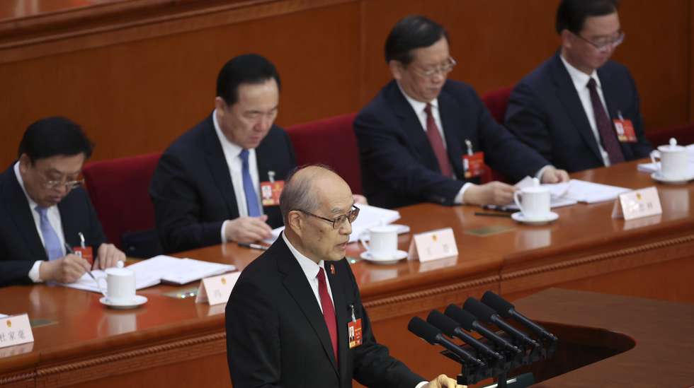 epa12805320 Chinese Chief Justice and President of the Supreme People's Court Zhang Jun (C) speaks during the second plenary meeting of the Fourth Session of the 14th National People's Congress (NPC) of China in Beijing, China, 09 March 2026. China holds two major annual political meetings, the National People's Congress (NPC) and the Chinese People's Political Consultative Conference (CPPCC) which run alongside and together are known as 'Lianghui' or 'Two Sessions’.  EPA/WU HAO
