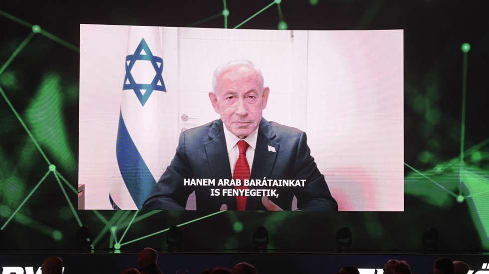 epa12838611 A video message of Israeli Prime Minister Benjamin Netanyahu is seen on a screen at the Conservative Political Action Conference (CPAC) in MTK Sportpark in Budapest, Hungary, 21 March 2026. The Hungarian edition of CPAC is held by the Center for Fundamental Rights for the fifth consecutive year.  EPA/Zoltan Balogh HUNGARY OUT