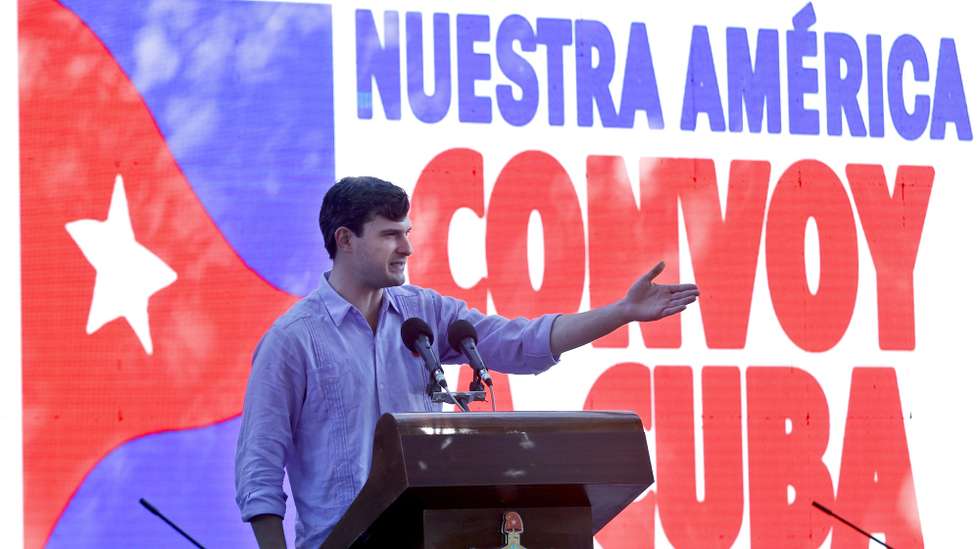 epa12839538 David Adler, the general coordinator of Progressive International, speaks during an event at the Cuban Institute of Friendship with the Peoples (ICAP) in Havana, Cuba, 21 March 2026. The global convoy Nuestra America, an initiative launched by the Progressive International in support of Cuba amid energy restrictions resulting from the U.S. embargo, is heading to Havana with humanitarian aid and activists from around the world, inspired by flotillas organized in other crisis contexts.  EPA/ERNESTO MASTRASCUSA / POOL