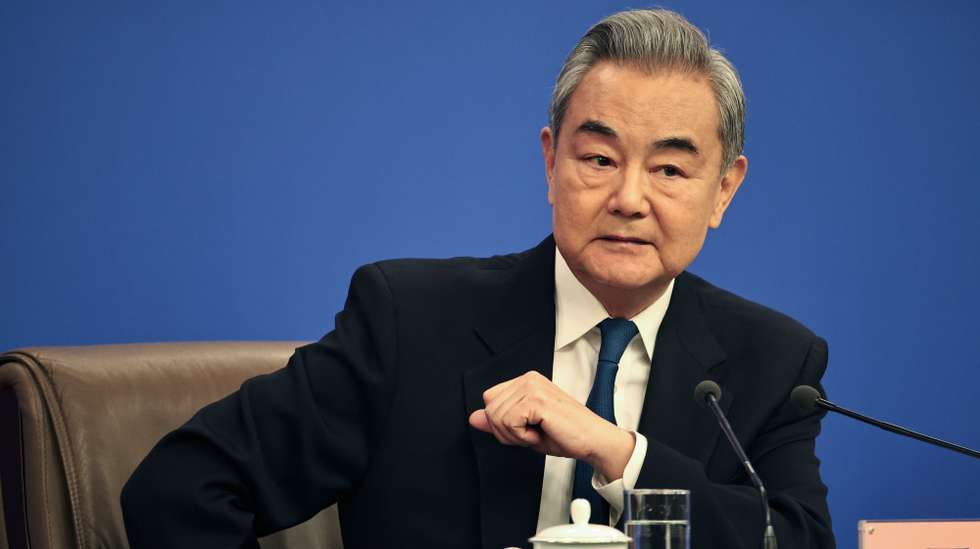 epa12802874 China’s Foreign Minister Wang Yi listens to a question during a press conference on foreign policy and external relations during the Fourth Session of the 14th National People's Congress in Beijing, China, 08 March 2026. China holds two major annual political meetings, the National People's Congress (NPC) and the Chinese People's Political Consultative Conference (CPPCC), held alongside each other and collectively known as the “Two Sessions”.  EPA/ANDRES MARTINEZ CASARES