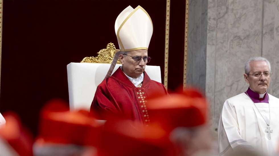 epa12867729 Pope Leo XIV (C) leads the celebration of the Passion of Christ at the St. Peter’s Basilica, in Vatican City, 03 April 2026.  EPA/MASSIMO PERCOSSI