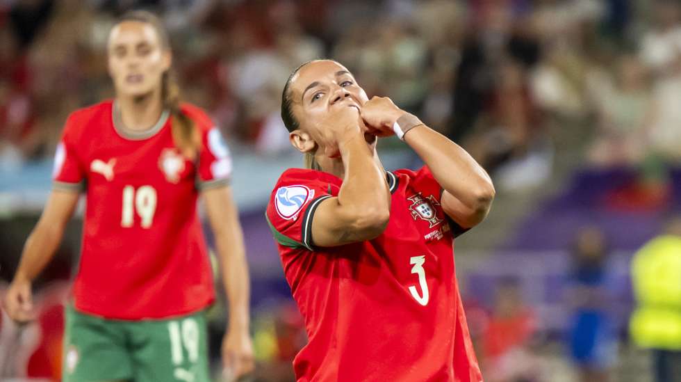 epa12232882 Portugal's Lucia Alves (R) reacts past Portugal's Diana Gomes (L) during the UEFA Women's EURO 2025 Group B soccer match between Portugal and Belgium at the stade de Tourbillon stadium in Sion, Switzerland, 11 July 2025.  EPA/JEAN-CHRISTOPHE BOTT   EDITORIAL USE ONLY