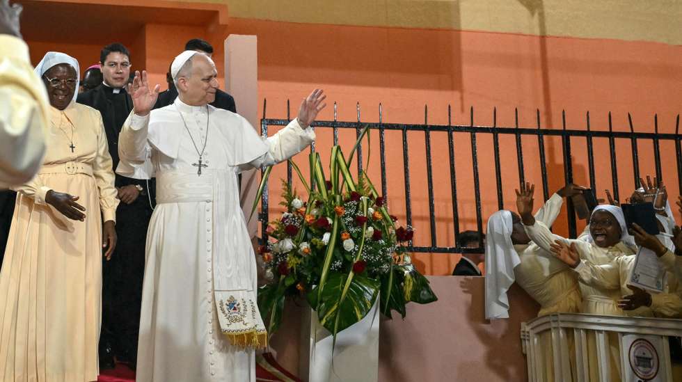 epa12892230 Pope Leo XIV (3rd L) waves to supporters as he leaves after his visit to the Ngul Zamba (Power of God) orphanage in Yaounde, Cameroon, 15 April 2026. The pontiff is on the second leg of an 11-day apostolic journey to Africa.  EPA/ALBERTO PIZZOLI / POOL