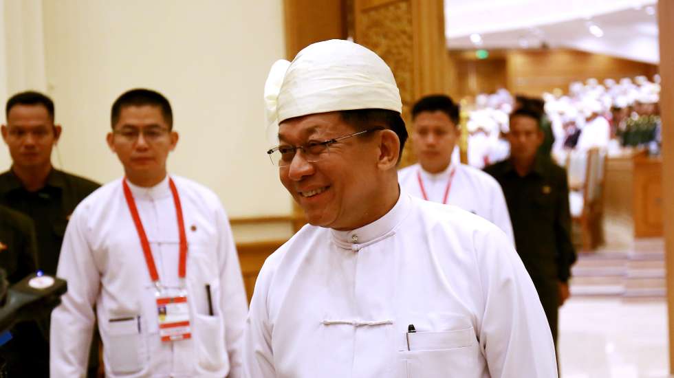 epa12879747 Former military chief and Myanmar president Min Aung Hlaing (R) talks to members of the media after the swearing in ceremony at the Union parliament in Naypyitaw, Myanmar, 10 April 2026. Min Aung Hlaing secured a parliamentary vote on 03 April 2026 to take over as the country’s president, five years after he ousted Aung San Suu Kyi’s elected government in 2021.  EPA/KO THURA