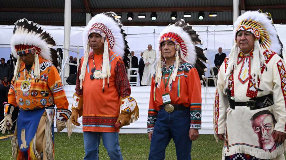 epa10091458 A handout picture provided by the Vatican Media shows Pope Francis meeting with indigenous people for a silent prayer at the Maskwacis cemetery, a town 100 kilometers south of Edmonton, Canada, 25 July 2022. The five-days visit is the first papal visit to Canada in 20 years.  EPA/VATICAN MEDIA HANDOUT  HANDOUT EDITORIAL USE ONLY/NO SALES