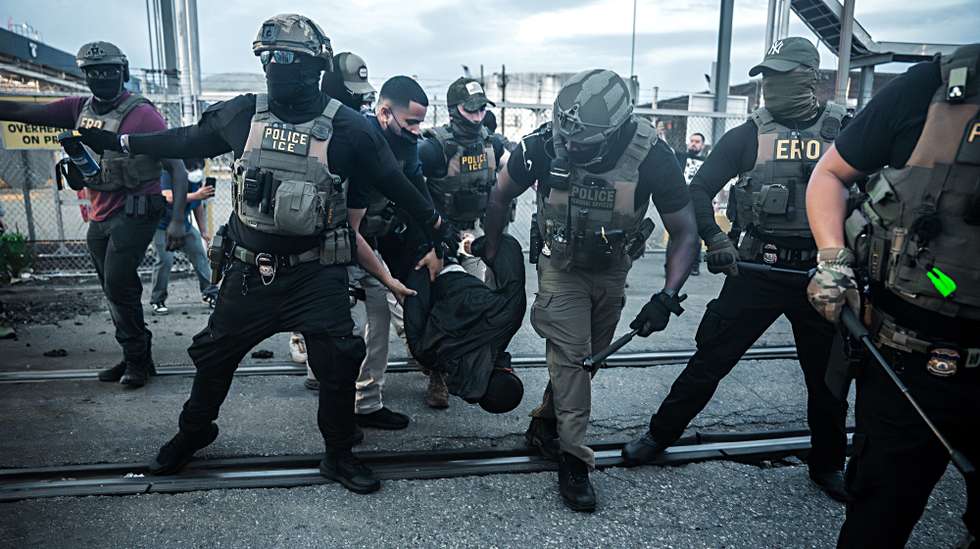 epa12996743 Immigration and Customs Enforcement (ICE) agents carry a protester after shooting him with a taser during a protest against the treatment of detainees at the Delaney Hall Detention Facility in Newark, New Jersey, USA, 26 May 2026 (issued 27 May 2026). About 300 detainees at Delaney Hall immigration facility center signed a letter, beginning a hunger strike over detention conditions since 22 May.  EPA/OLGA FEDOROVA