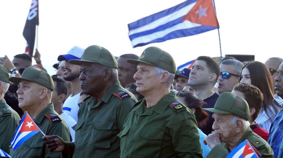 epa12984593 Cuban President Miguel Diaz-Canel (C) attends an event in support of former Cuban President Raul Castro in Havana, Cuba, 22 May 2026. The Cuban government is holding a rally in support of Raul Castro, following the US Department of Justice (DOJ) unsealing, on 20 May 2026, a federal criminal indictment charging the 94-year-old Castro, alongside five other co-defendants, for his alleged role in the February 1996 shoot-down of two unarmed US civilian aircraft, and his designation as a 'fugitive from justice.'  EPA/Ernesto Mastrascusa