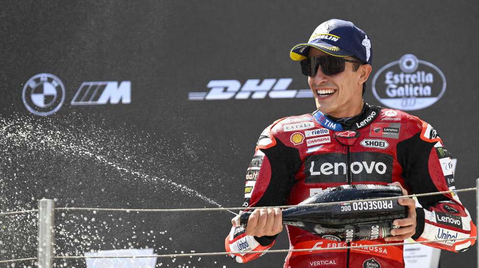 epa13022158 First placed Ducati Lenovo rider Marc Marquez of Spain celebrates on the podium after the MotoGP race of the Motorcycling Grand Prix of Hungary at the Balaton Park Circuit in Balatonfokajar, Hungary, 07 June 2026.  EPA/Boglarka Bodnar HUNGARY OUT