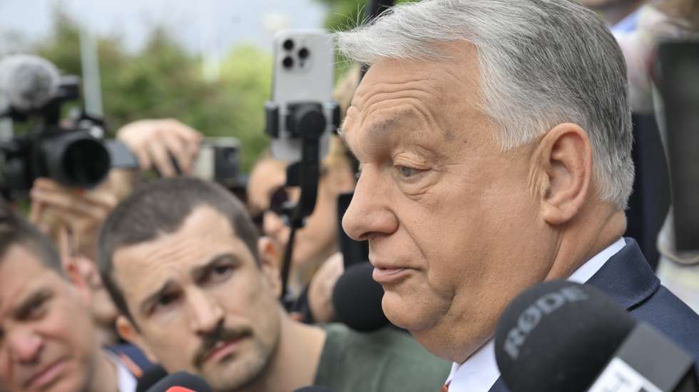 epa13034178 Fidesz party head and former prime minister Viktor Orban talks to the press as he arrives for the opposition Fidesz party's working congress held for renewing its officers at Budapest Congress Center in Budapest, Hungary, 13 June 2026. Orban, the sole candidate for presidency, is expected to be re-elected party leader for one year.  EPA/Zoltan Mathe HUNGARY OUT