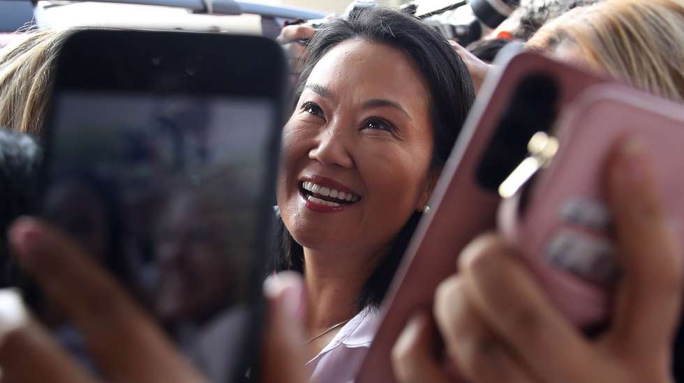 epa13031221 Right-wing presidential candidate Keiko Fujimori arrives at a press conference in Lima, Peru, 11 June 2026. Fujimori said she would wait for the final vote count from the National Office of Electoral Processes (ONPE) before making a statement.  EPA/Paolo Aguilar