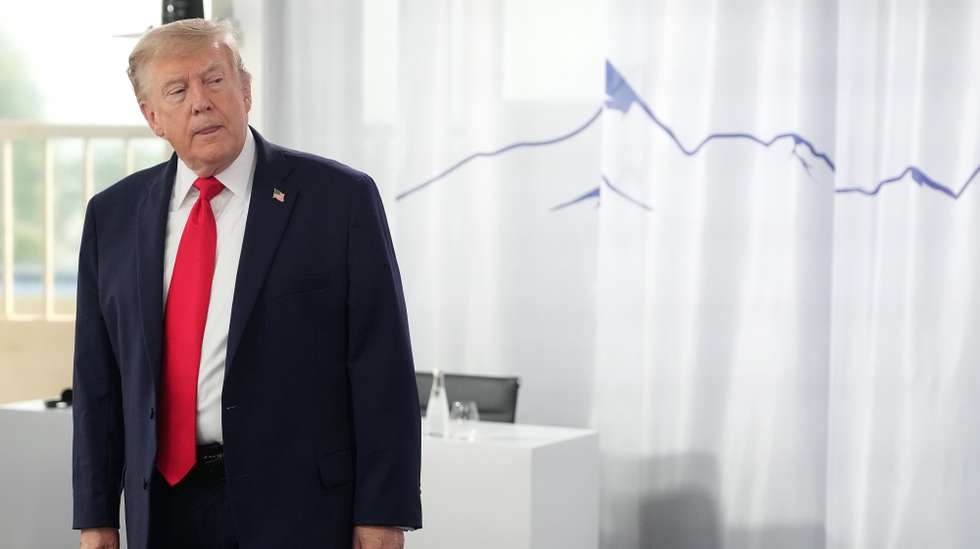 epa13040649 US President Donald Trump waits for the start of a working session at the G7 summit in Evian-les-Bains, France, 16 June 2026. The 52nd G7 Summit takes place in Evian-les-Bains from 15 to 17 June 2026.  EPA/THIBAULT CAMUS / POOL MAXPPP OUT