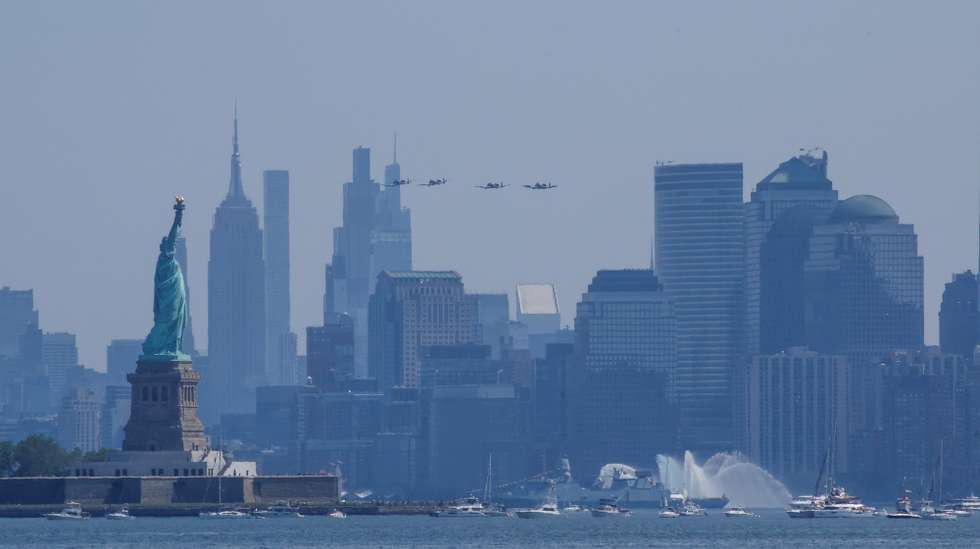epa13086056 Military ships sail during the Parade of Sail international naval gathering marking the 250th Independence Day, as seen from Bayonne, New Jersey, USA, 04 July 2026. The US marks in 2026 the 250th anniversary of America, known as the Semiquincentennial or SemiQuin, the 250 years since the adoption of the Declaration of Independence on 04 July 1776.  EPA/Kena Betancur