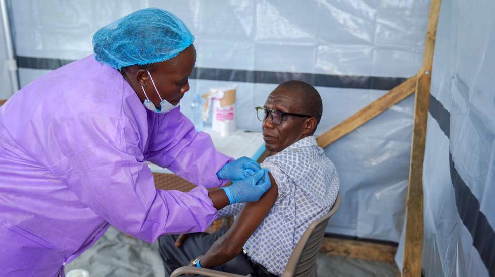 epa13326075 A medical staff injects a patient with a dose of ‘Tumaini’ trial vaccine in Bunia, Ituri, Democratic Republic of Congo, 23 October 2026. The Coalition for Epidemic Preparedness Innovations, CEPI, said the Phase 2/3 clinical trial, known as Tumaini or ‘Hope’ in Swahili, was launched in Bunia. Tumaini aims to close a gap as there is currently no approved vaccine against Bundibugyo virus which causes Ebola disease.  EPA/STRINGER