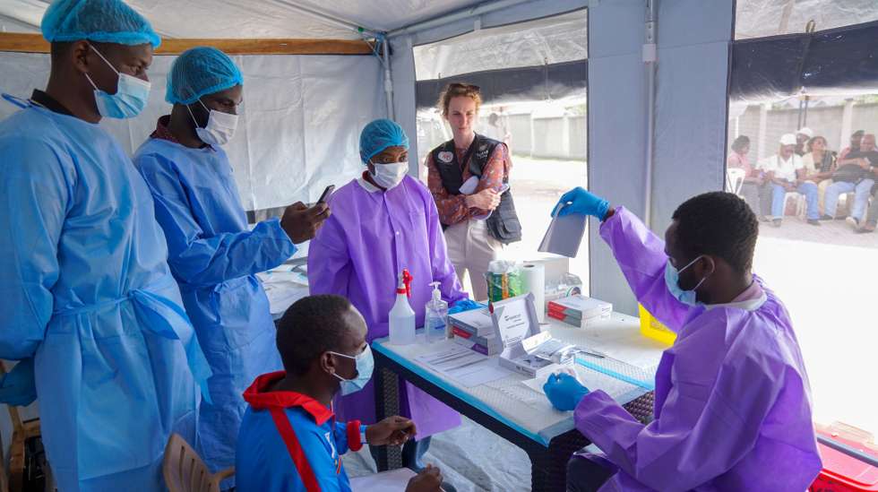 epa13326084 A patient is checked before receiving a dose of ‘Tumaini’ trial vaccine in Bunia, Ituri, Democratic Republic of Congo, 23 October 2026. The Coalition for Epidemic Preparedness Innovations, CEPI, said the Phase 2/3 clinical trial, known as Tumaini or ‘Hope’ in Swahili, was launched in Bunia. Tumaini aims to close a gap as there is currently no approved vaccine against Bundibugyo virus which causes Ebola disease.  EPA/STRINGER