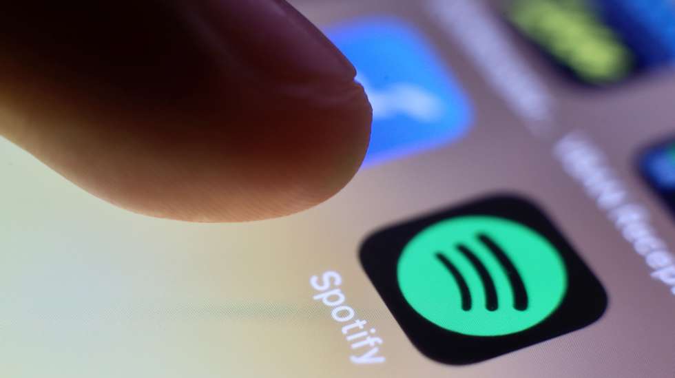 epa09044616 (FILE) - The logo of music streaming company Spotify is pictured on a smartphone in Taipei, Taiwan, 30 July 2020 (reissued 01 March 2021). Spotify confirmed on 01 March 2021 it had removed hundreds of K-Pop releases from its worldwide streaming services over licensing disputes with South Korean distributor Kakao M.  EPA/RITCHIE B. TONGO *** Local Caption *** 56665503