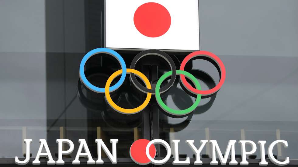 epa10335829 The emblem at Japan Sport Olympic Square is displayed on the wall of the building near the National Stadium in Tokyo, Japan, 29 November 2022. Japanese prosecutors and antitrust officials on 29 November 2022 raided firms on suspicion of violating antimonopoly law for their possible involvement in alleged bid rigging for contracts related to test events for Tokyo Olympics and Paralympics prior to the games. Investigators from the Tokyo District Public Prosecutors Office's special squad and the Fair Trade Commission jointly searched ADK Marketing Solutions Inc.,a major advertising agency,  and a firm under the aegis of advertising giant Dentsu Group Inc.  EPA/KIMIMASA MAYAMA
