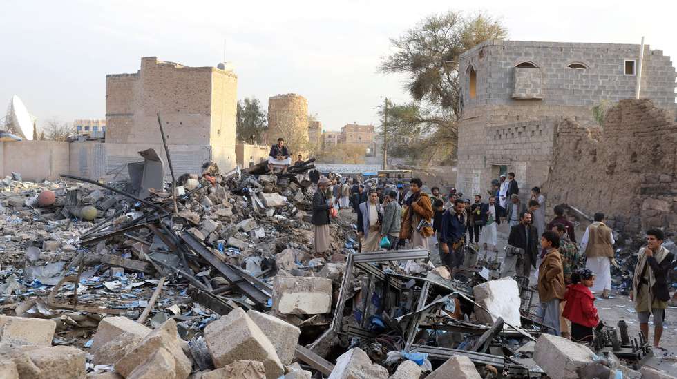 epa11977191 People inspect the rubble of an event hall struck by US airstrikes in Sana'a, Yemen, 20 March 2025. The United States has been launching a wave of airstrikes since 15 March on at least four Houthis-controlled provinces of Yemen, including Sana'a, leaving more than 50 people dead and over 100 injured, according to Houthis-run Al-Masirah TV. The US bombardments come amid heightened tensions between the Houthis and the United States over Houthi attacks on Israel and shipping in waters around Yemen.  EPA/YAHYA ARHAB