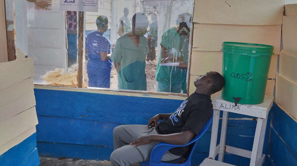 epa13027158 A man suspected of being infected with Ebola is admitted at the Rwampara Hospital in Rwanpara, Ituri, Democratic Republic of the Congo, 09 June 2026. The outbreak is caused by the Bundibugyo strain of the Ebola virus, for which there is no treatment, although three vaccines are in development.  EPA/DIEUDONNE DIROLE