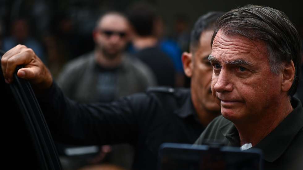 epa12377407 Brazilian former President Jair Bolsonaro leaves the DF Star Hospital in Brasilia, Brazil, 14 September 2025. Bolsonaro returned to house arrest at his residence in Brasilia hours after being admitted to a private hospital for surgery. The former head of state was sentenced by the Supreme Court to 27 years and three months in prison for conspiring against the democratic order following his defeat in the 2022 elections against current President Luiz Inacio Lula da Silva.  EPA/ANDRE BORGES