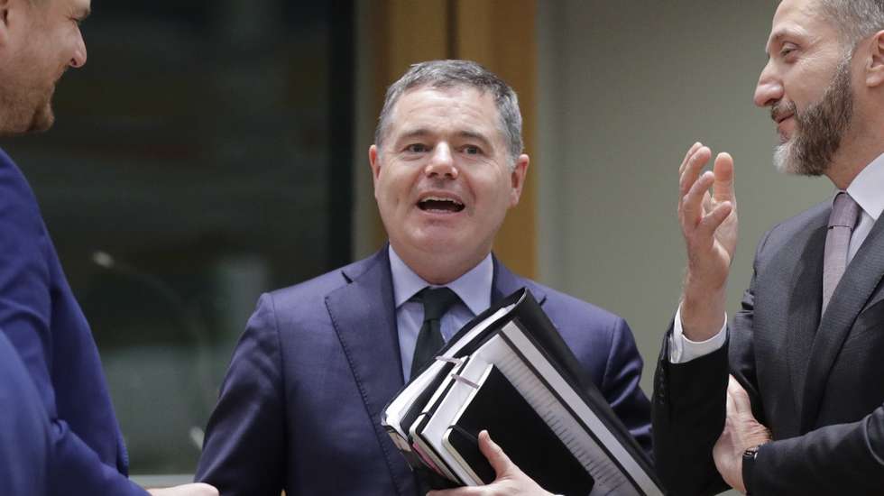 epa10350180 President of the Eurogroup, Irish Finance Minister Paschal Donohoe (C) at the start of Eurogroup finance ministers meeting in Brussels, Belgium, 05 December 2022.  The Eurogroup re-elected by consensus Paschal Donohoe, Minister for Finance of Ireland, as President of the Eurogroup, for a second term of two and a half years that will start from 13 January 2023.  EPA/OLIVIER HOSLET