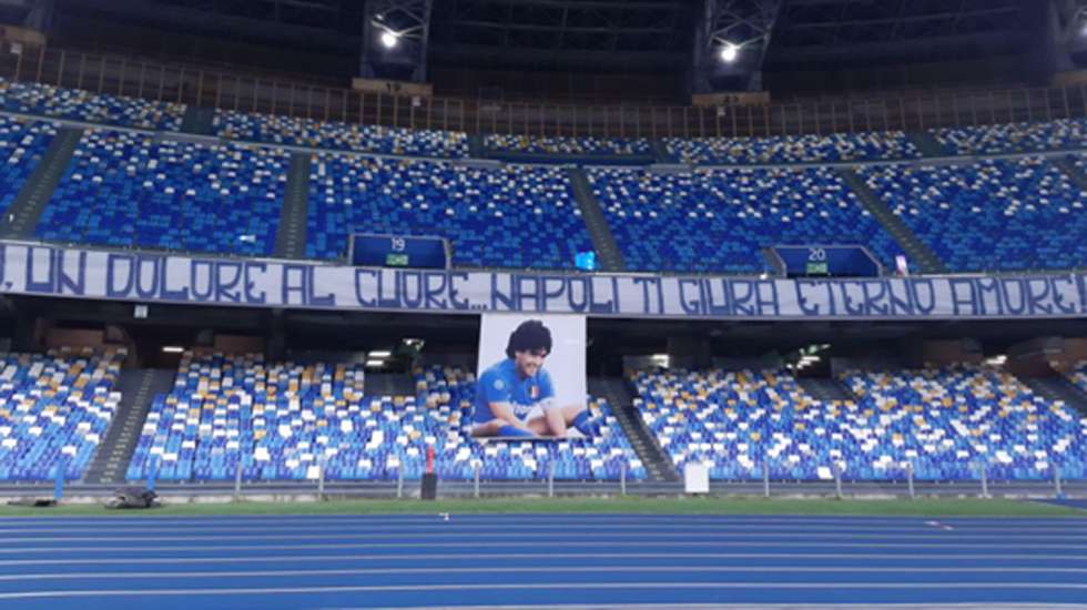 epa08851831 A banner displayed at the San Paolo stadium as a tribute to Diego Armando Maradona prior the Italian Serie A soccer match SSC Napoli vs AS Roma, Naples, Italy,  29 November 2020.  Maradona who played for Napoli died on 25 November 2020 aged 60.  EPA/CIRO FUSCO