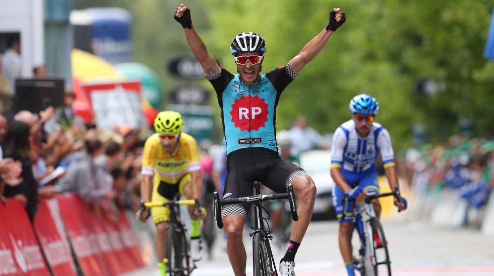 epa07764468 Portuguese rider of Radio Popular - Boavista team Joao Benta celebrates after winning the eighth stage of the 81st CyclingTour of Portugal over 156,6 km between Viana do Castelo and Felgueiras, Portugal, 09 August 2019.  EPA/NUNO VEIGA