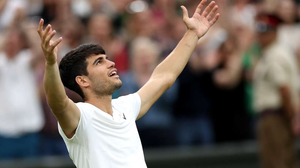 epa11459849 Carlos Alcaraz of Spain celebrates after winning the Men's 3rd round match against Frances Tiafoe of the USA at the Wimbledon Championships, Wimbledon, Britain, 05 July 2024. Alcaraz won in five sets.  EPA/ADAM VAUGHAN  EDITORIAL USE ONLY