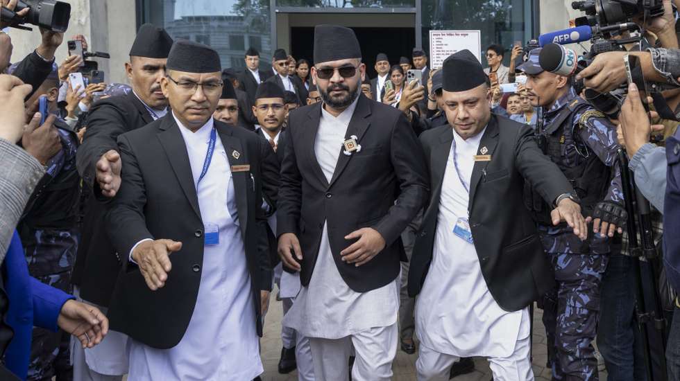 epaselect epa12850312 Balendra Shah, 35, reacts upon arrival for the oath-taking ceremony of newly elected members of Nepal's parliament at the Federal Parliament in Kathmandu, Nepal, 26 March 2026. The former mayor and senior leader of the Rastriya Swatantra Party (RSP), popularly known as Balen Shah, is set to be sworn in as prime minister on 27 March 2026 after his party secured a landslide victory in the snap parliamentary election held on 05 March 2026.  EPA/NARENDRA SHRESTHA