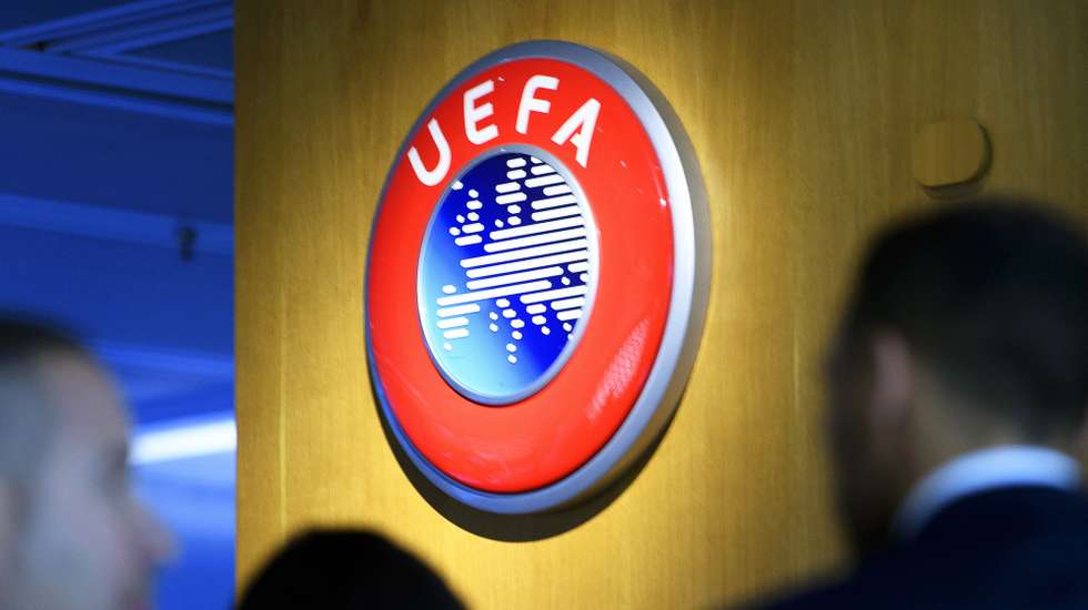 epa08337222 (FILE) - The UEFA logo on display after the meeting of the UEFA Executive Committee at the UEFA headquarters in Nyon, Switzerland, 07 December 2017 (re-issued on 01 April 2020). The UEFA has postponed on 01 April all planned matches of the national team's in June until further notice. The same applies to Champions and Europa League matches of this season.  EPA/LAURENT GILLIERON *** Local Caption *** 55950362