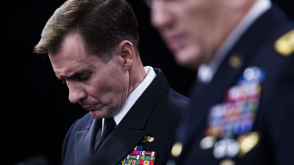 epa04413659 US Pentagon Press Secretary John Kirby (L) listens to US Director of Operations J3, Lt. Gen. William C. Mayville Jr. (R) brief the media on airstrikes on Islamic State (IS) positions in eastern Syria in the Pentagon Briefing Room in Arlington, Virginia, USA, 23 September 2014. Mayville said that missiles took out IS command and control facilities, training camps, and explosive facilities. The United States and five Arab allies launched the first airstrikes in Syria against the Islamic State Sunni extremist group on 23 September, and the Pentagon said a unilateral attack targeted an al-Qaeda affiliate in the north.  EPA/JIM LO SCALZO