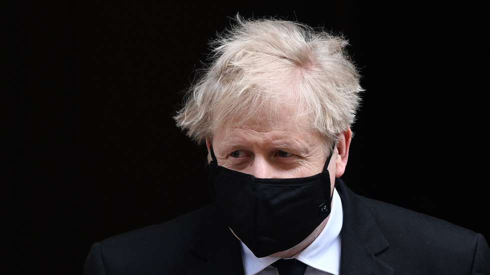 epa09134642 British Prime Minister Boris Johnson departs 10 Downing Street for Prime Minister Questions at parliament in London, Britain, 14 April 2021.  EPA/ANDY RAIN