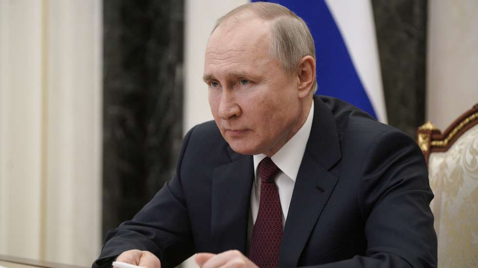 epa09082234 Russian President Vladimir Putin attends a meeting on social and economic development of Crimea and Sevastopol, via teleconference call, at the Kremlin in Moscow, Russia, 18 March 2021.  EPA/ALEXEI DRUZHININ / SPUTNIK / KREMLIN POOL MANDATORY CREDIT
